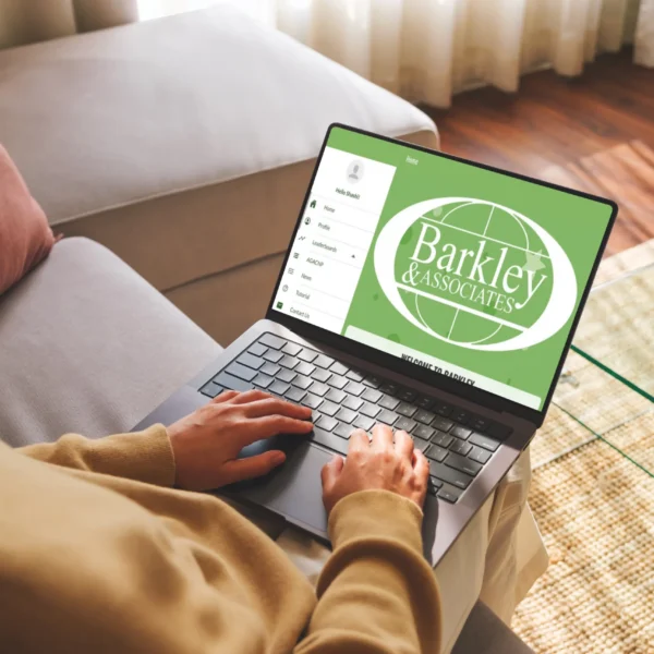 person_couch_laptop_shutterstock_2423248201-1-scaled-1.webp