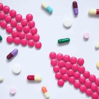 Two,Pink,Arrows,Made,By,Pills,Among,Many,Different,Medical